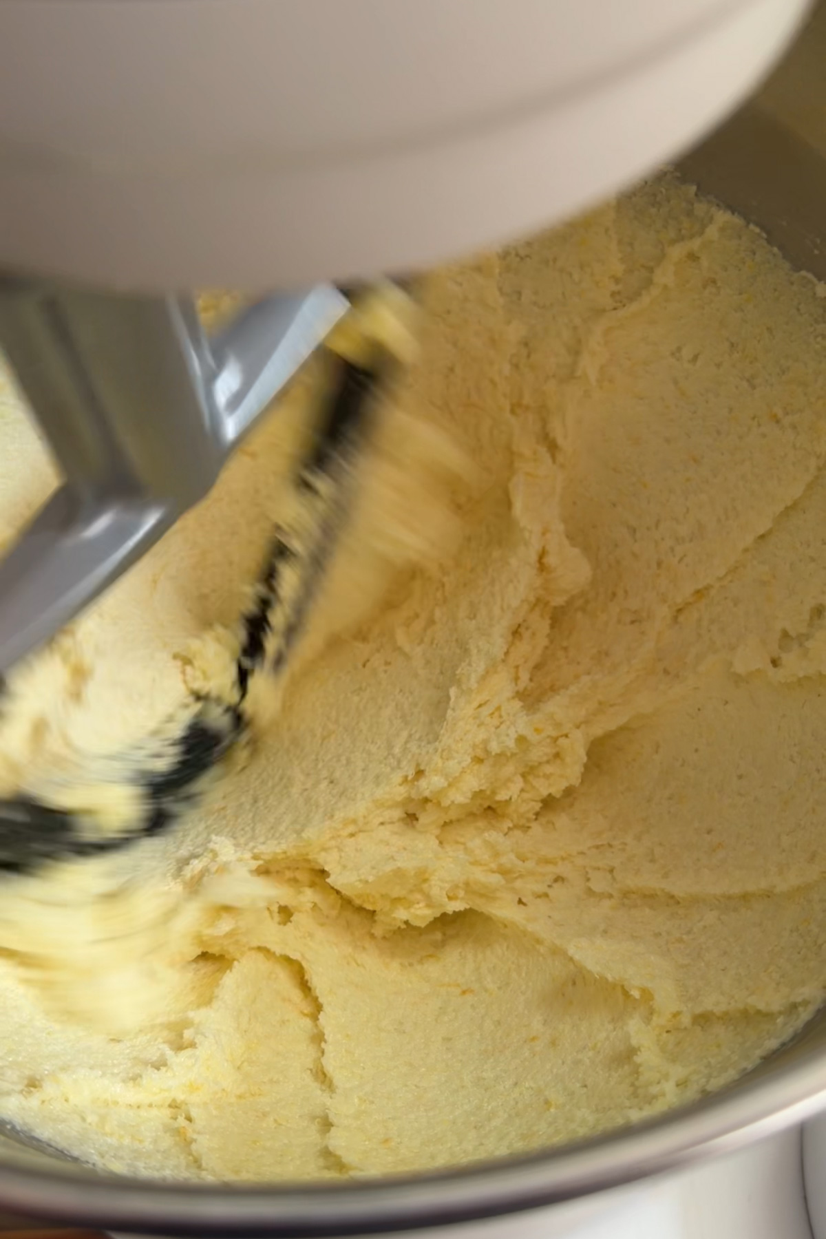 Picture of creamed butter for lemon blueberry mascarpone cake.