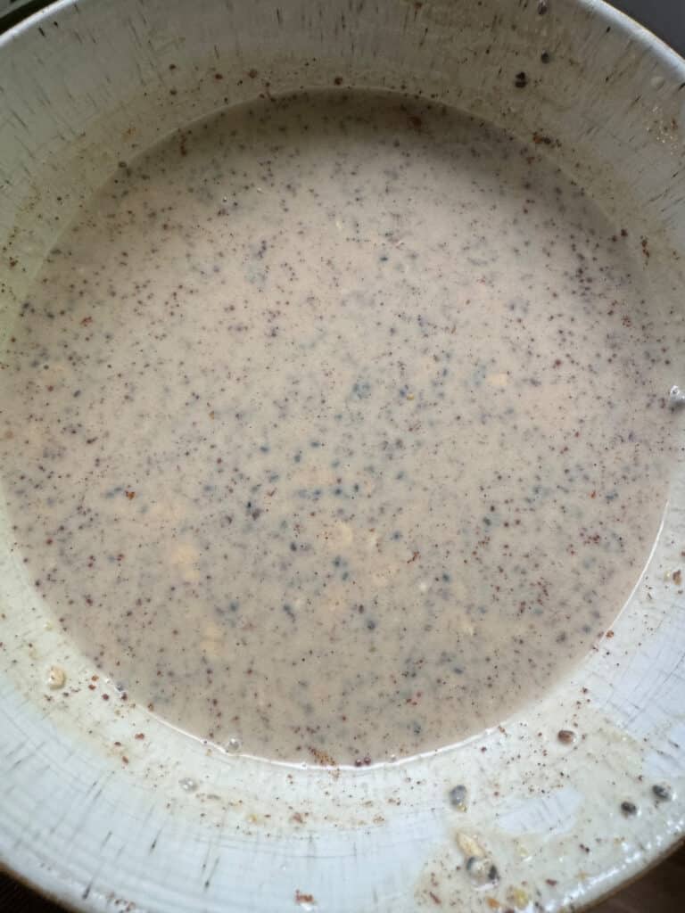 Biscoff overnight oats in a bowl before chilling overnight. 