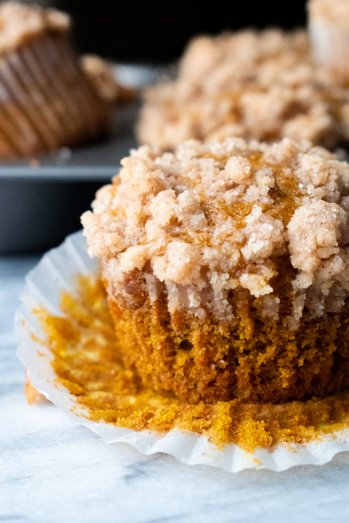 Pumpkin banana bread muffins with cinnamon streusel.