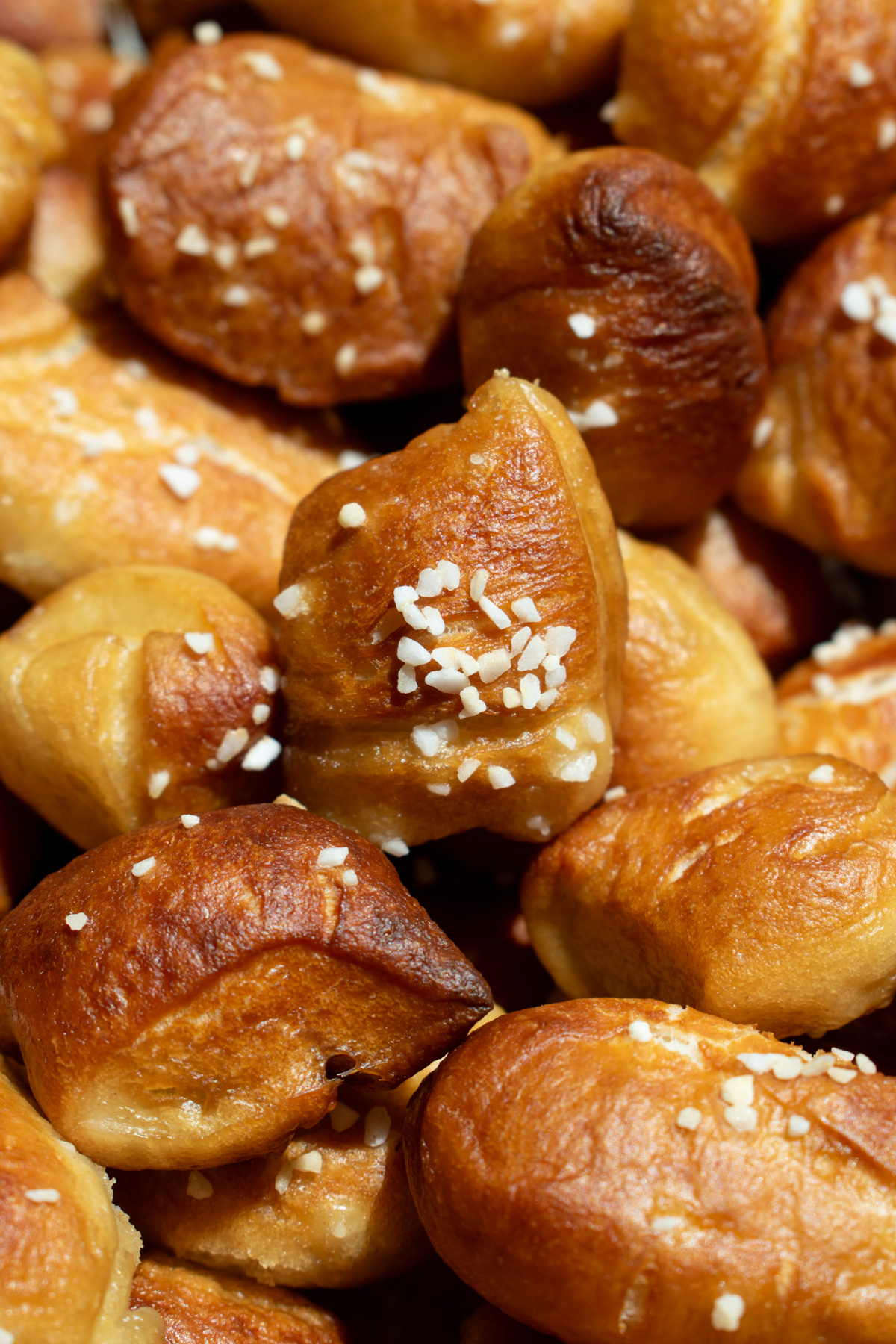 Sourdough discard pretzel bites on a  metal baking tray.