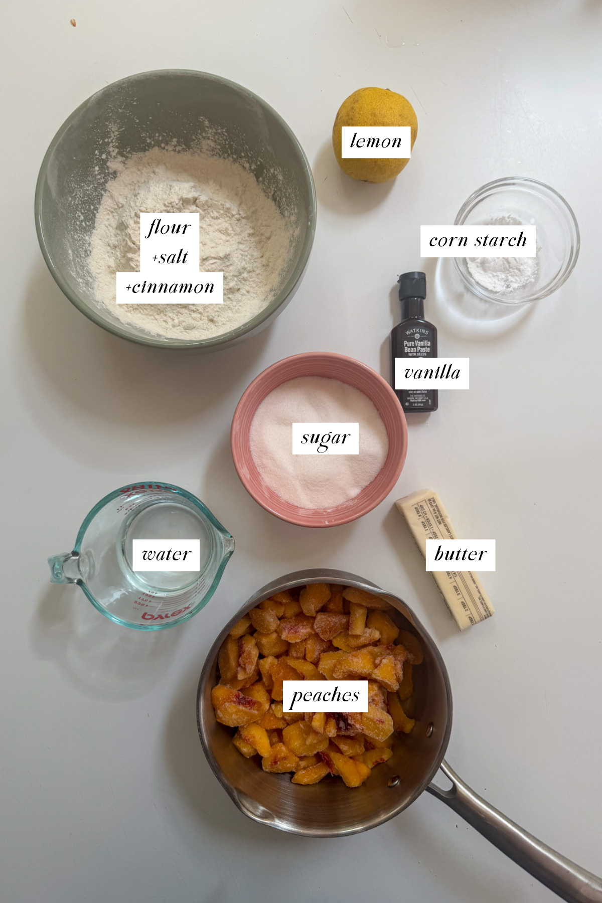 The ingredients needed for peach crumb bars with labels. 