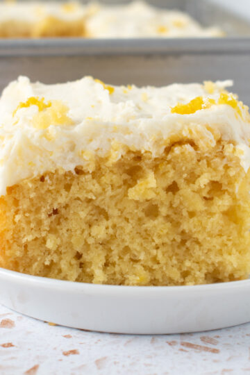 Picture of a slice of sourdough lemon snack cake.