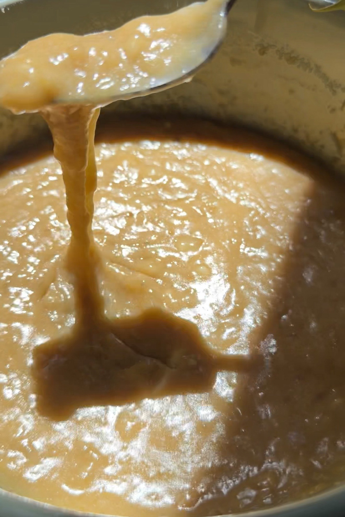 Picture of step 1 of the instructions for making chocolate-chunk banana bread, mixing the wet ingredients.