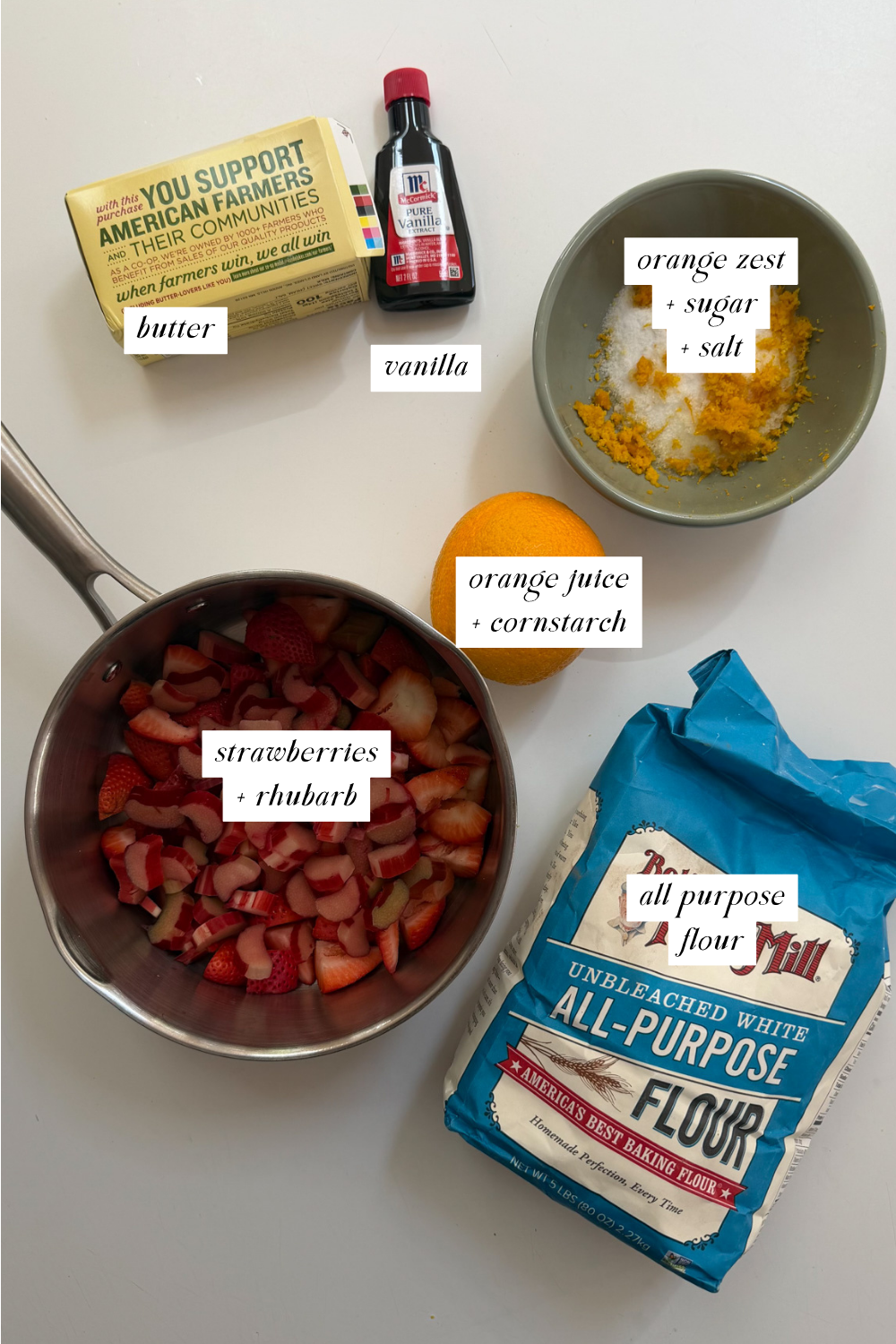 The ingredients needed for strawberry rhubarb crumb bars with labels. 