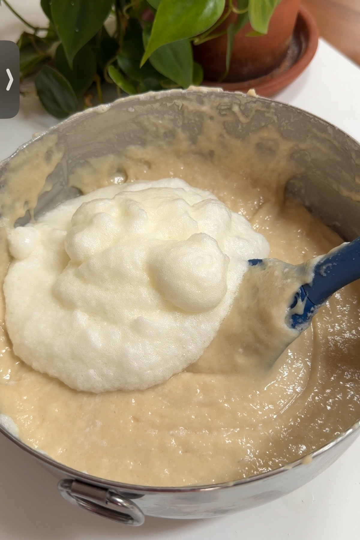 Egg whites being whipped into the batter for sourdough discard funfetti cake.