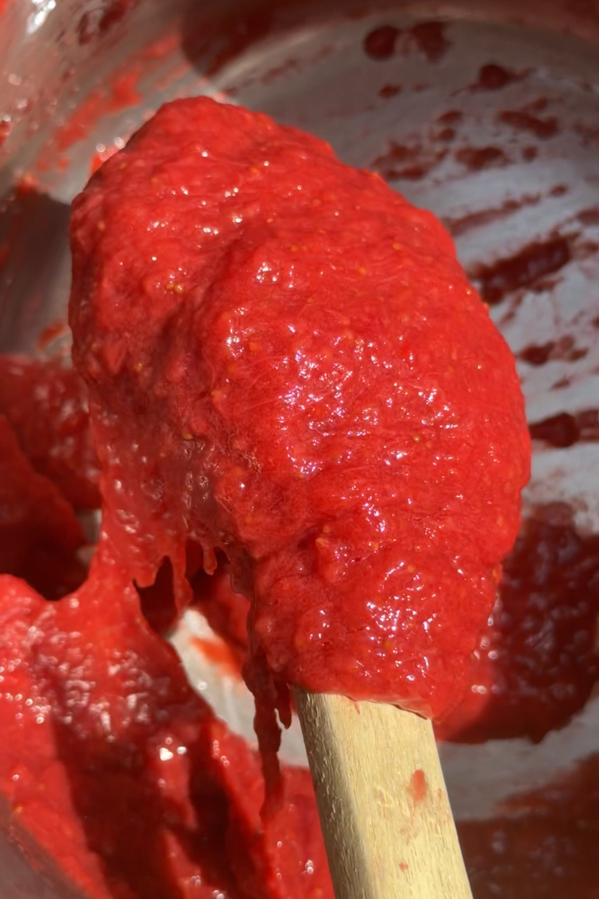 Strawberry reduction for strawberry cake with strawberry filling.