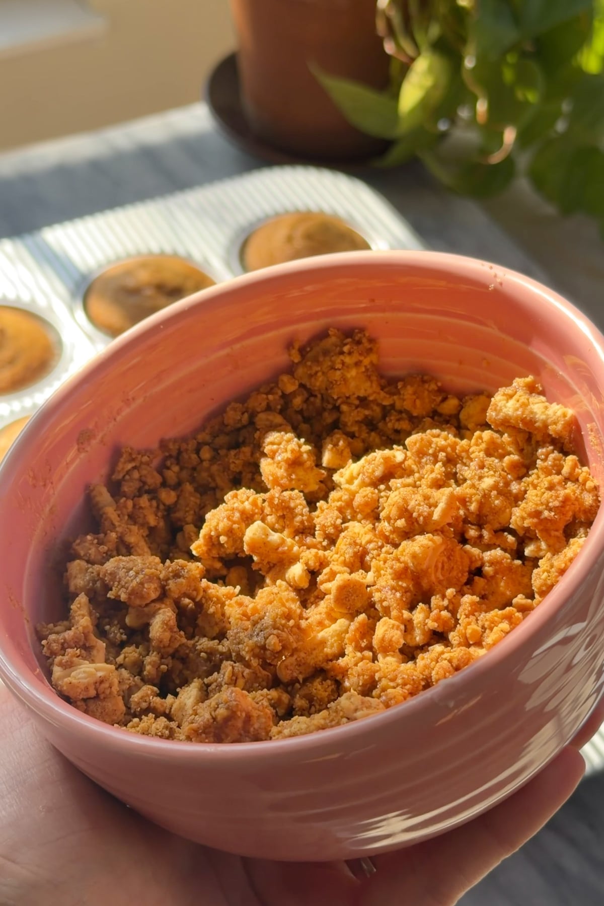 Pumpkin crunch topping for pumpkin crunch cupcakes in a pink bowl. 